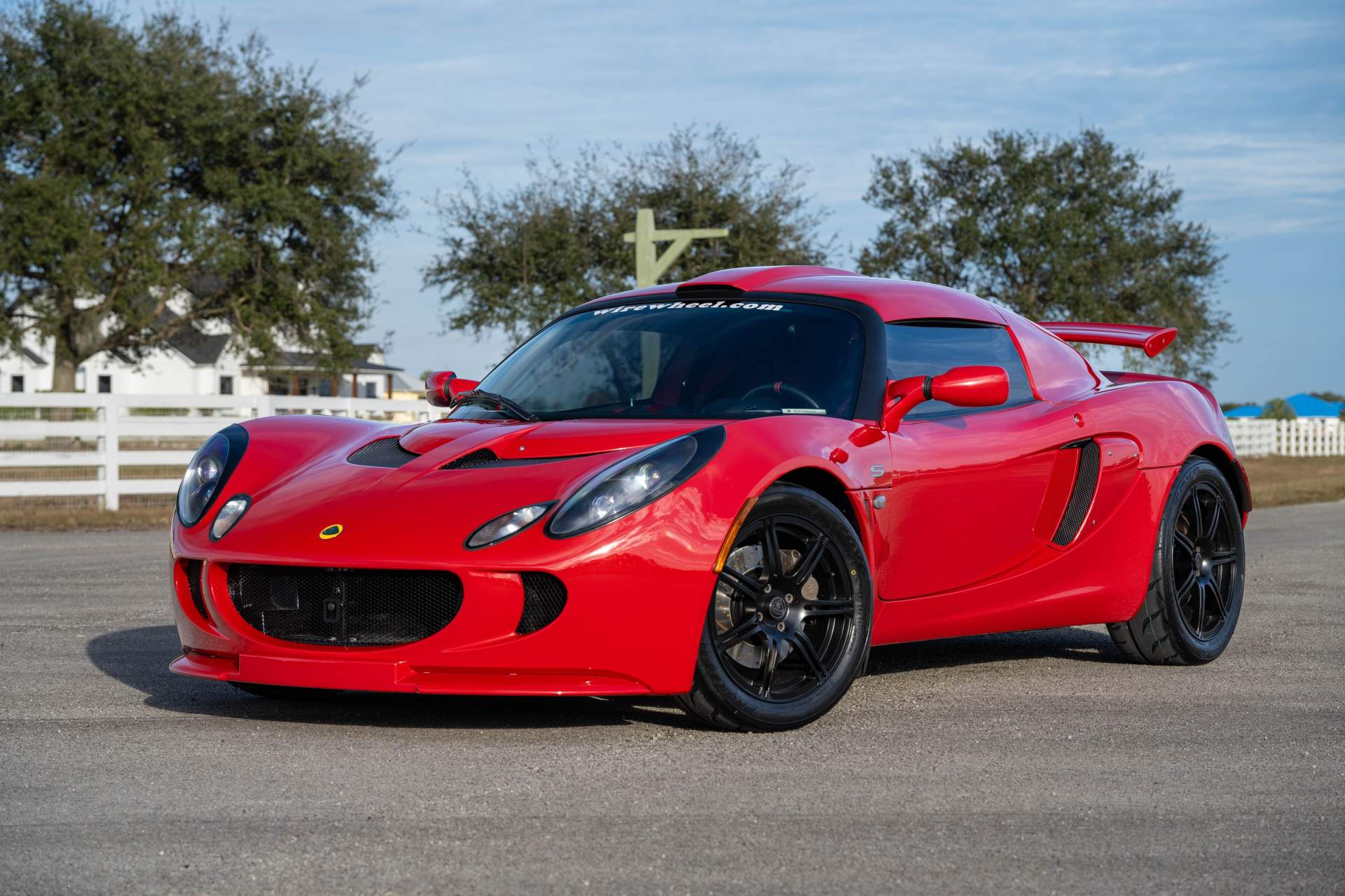2007 Lotus Exige S Ardent Red_blk lead